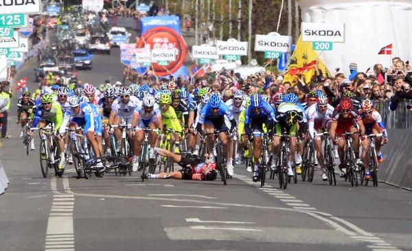 Mark Cavendish (Sky) hits the deck in the finishing straight.