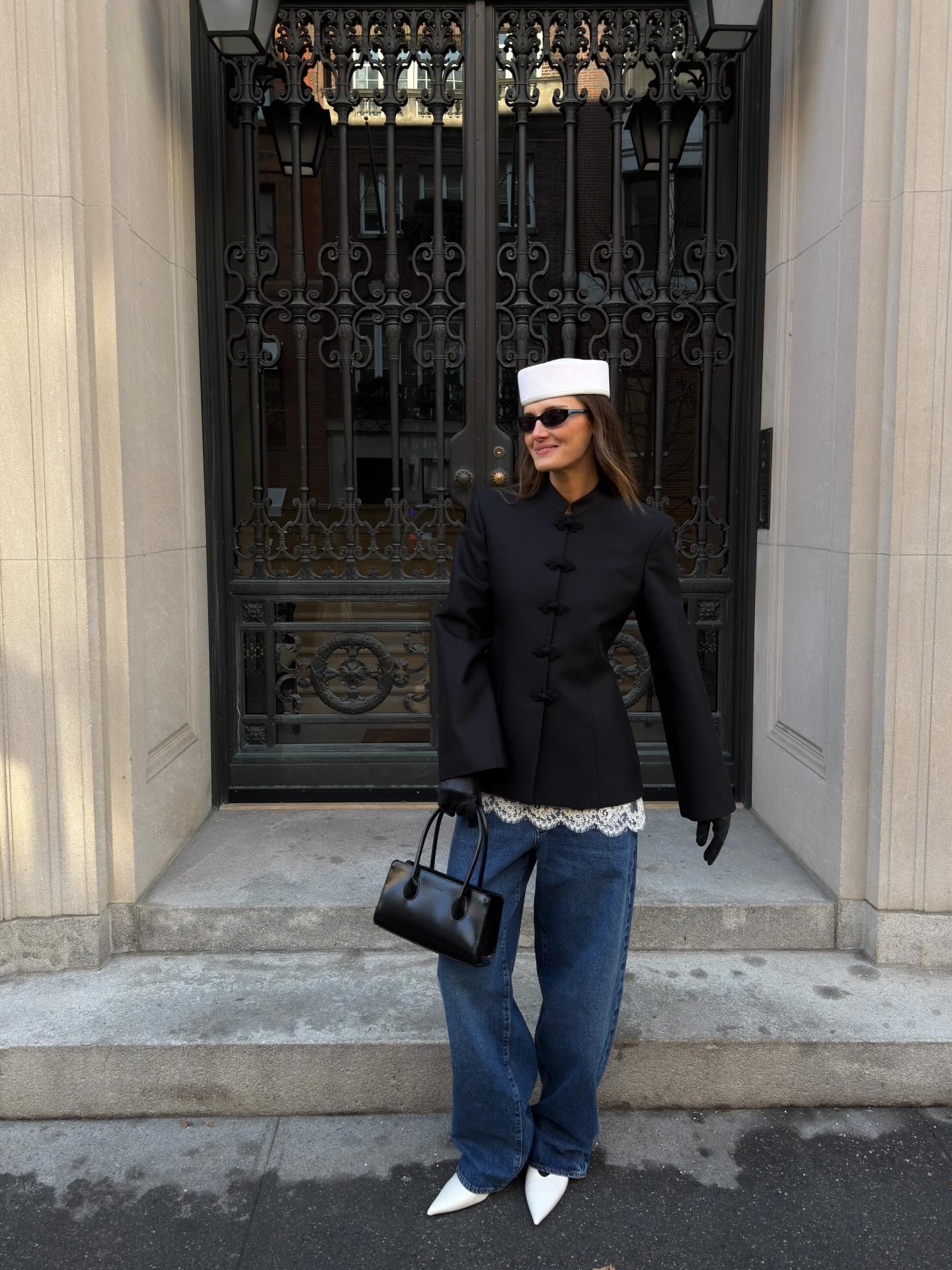 Coco Schiffer wearing a frog closure jacket