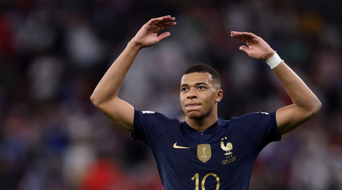 Kylian Mbappe of France celebrates after scoring the team&#039;s third goal during the FIFA World Cup Qatar 2022 Round of 16 match between France and Poland at Al Thumama Stadium on December 04, 2022 in Doha, Qatar.