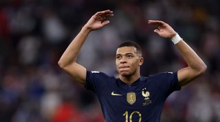 Kylian Mbappe of France celebrates after scoring the team's third goal during the FIFA World Cup Qatar 2022 Round of 16 match between France and Poland at Al Thumama Stadium on December 04, 2022 in Doha, Qatar.