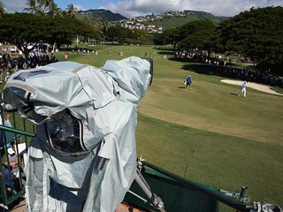 Television camera next to the putting green at a golf event