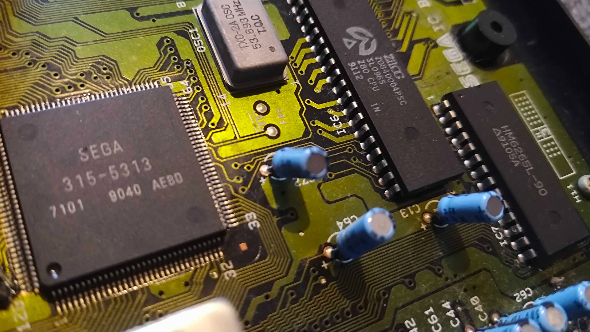 Close up of Sega Mega Drive motherboard with chips in view.