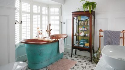 White bathroom with bath tub