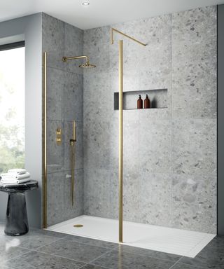 Wet room with gold hardware