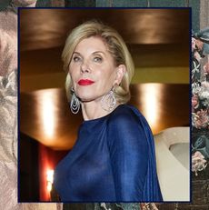 christine baranski in a blue dress and silver earrings at a gilded age event at the met opera in nyc