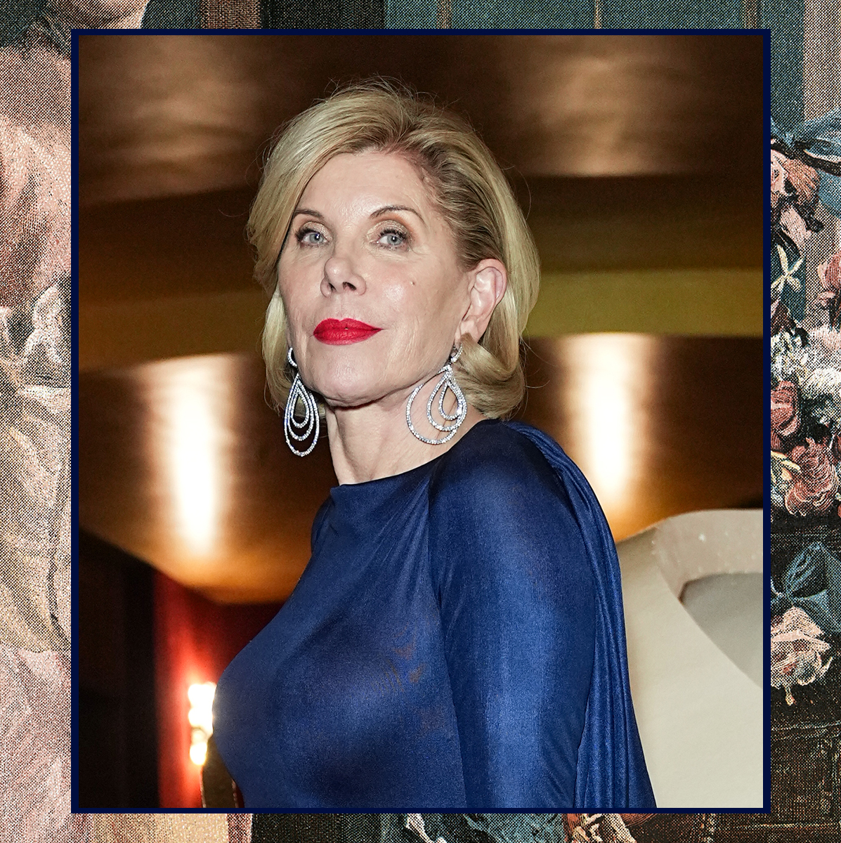 christine baranski in a blue dress and silver earrings at a gilded age event at the met opera in nyc