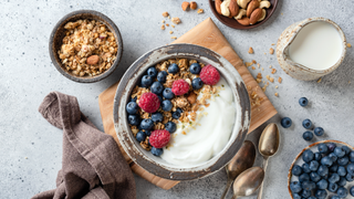 Bowl of yoghurt with granola and berries