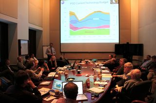 Key decisions are being made that will shape NASA's space science program. Photo captures a Planetary Science Decadal Steering Committee meeting at the National Academies' Beckman Center in Irvine, Calif. That report, issued last year, has been derailed by proposed NASA budget cuts.