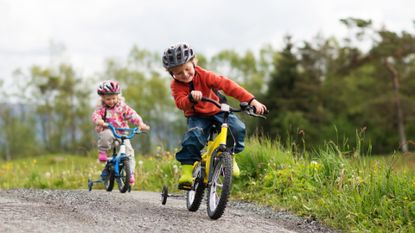 Image shows kids on kids bikes