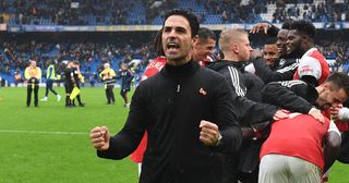 Arsenal manager Mikel Arteta celebrates after the Premier League match between Chelsea FC and Arsenal FC at Stamford Bridge on November 06, 2022 in London, England.