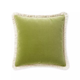 Lime green throw pillow with fringe trim