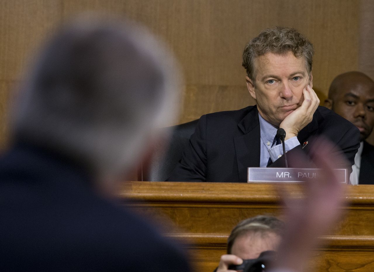 Sen. Rand Paul listens during the Senate confirmation hearings.