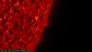 This image of the Mercury transit's final minutes was taken by NASA's Solar Dynamics Observatory on May 9, 2016, with its Atmospheric Imaging Assembly.
