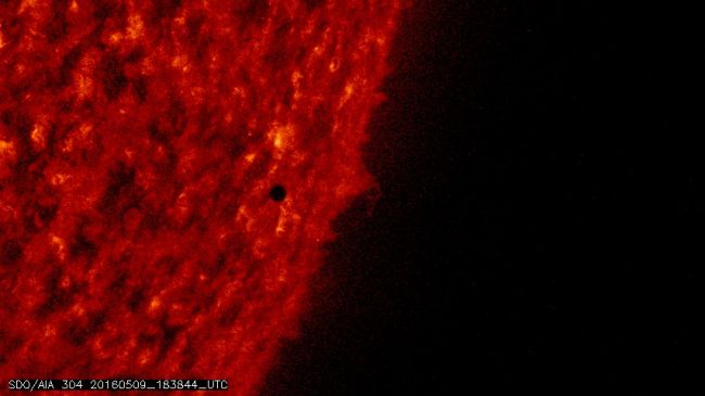 This image of the Mercury transit's final minutes was taken by NASA's Solar Dynamics Observatory on May 9, 2016, with its Atmospheric Imaging Assembly.