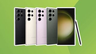 A product shot of various Samsung Galaxy S23 Ultras on a green background