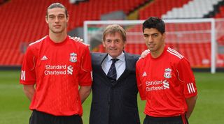 Liverpool manager Kenny Dalglish alongside January signings Andy Carroll and Luis Suarez in 2011.