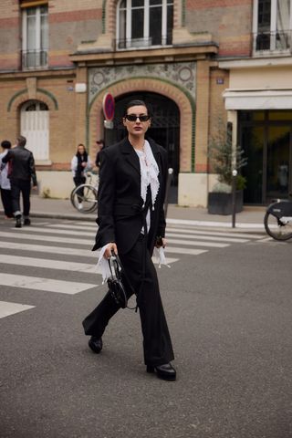 Woman wearing street style at Paris Fashion Week.