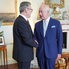 King Charles III welcomes Sir Keir Starmer during an audience at Buckingham Palace, where he invited the leader of the Labour Party to become Prime Minister and form a new government following the landslide General Election victory for the Labour Party, on July 5, 2024 in London, England. 