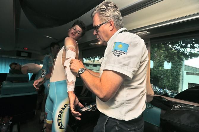 Jakob Fuglsang gets some fresh bandages before stage 19