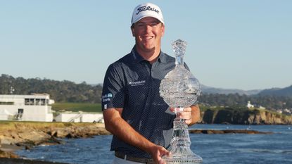 Tom Hoge with the trophy after winning the 2022 Pebble Beach Pro-Am