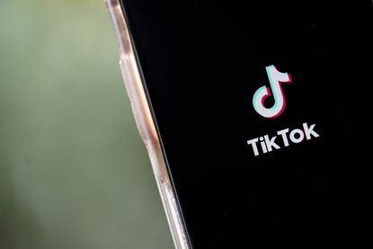 TikTok logo on a phone.