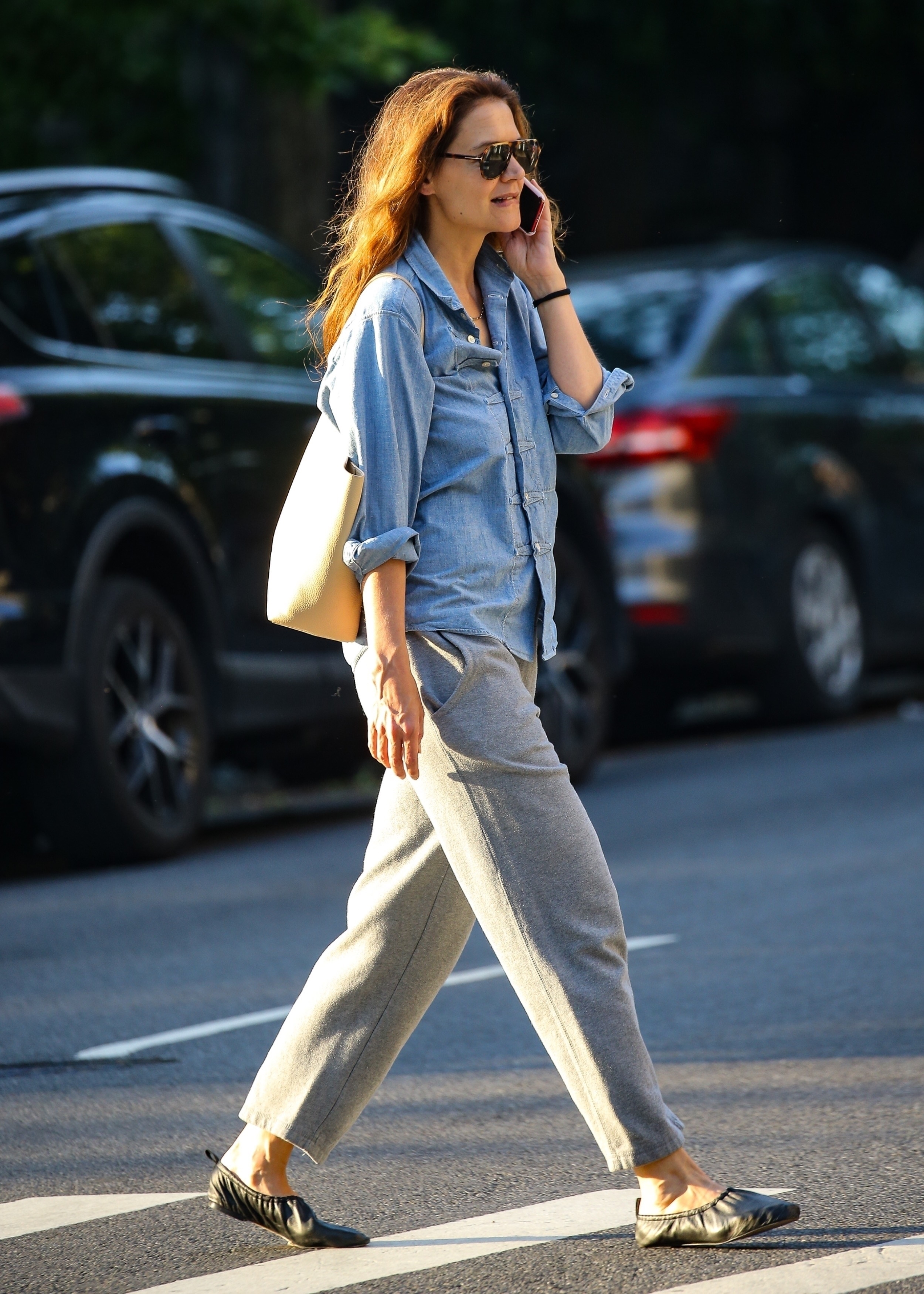 Katie Holmes walking in new york wearing sweats and ballet flats