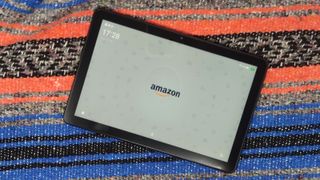 The Amazon Fire HD 10 (2023) on a colored background.