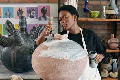 Zizipho Poswa photography and ceramics at Southern Guild Gallery, exploring Black hair as a medium for sculpture