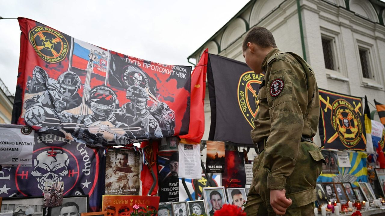 A Wagner Group soldier visits a makeshift memorial in Moscow for the group&#039;s leader Yevgeny Prigozhin after his death in a plane crash in August 2023