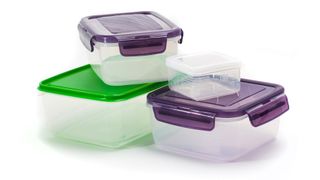 Plastic containers with green and purple lids