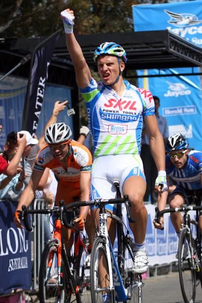 Kittel raises one arm as he celebrates yet another win in 2011 on stage 3 of the Jayco Herald Sun Tour.