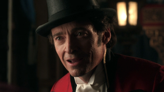 Hugh Jackman smiling in The Greatest Showman