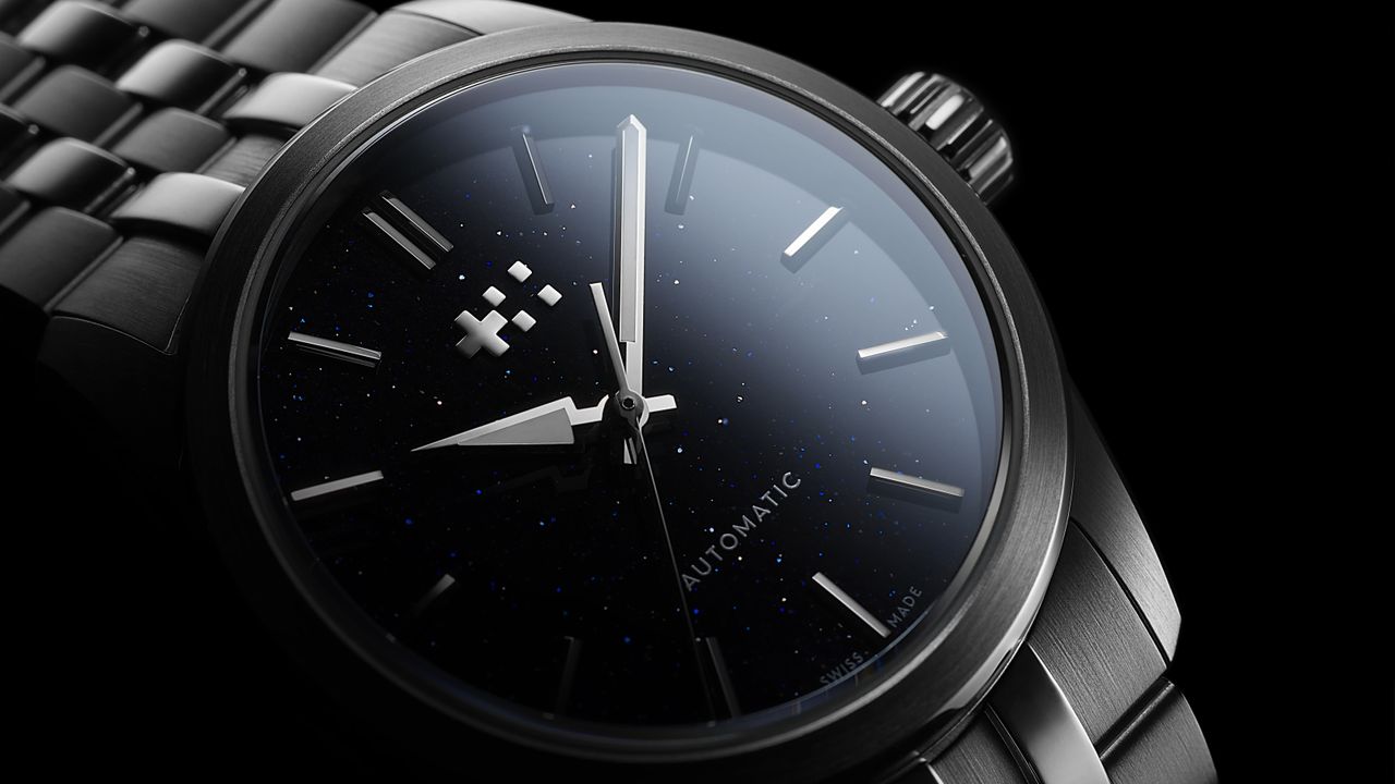 The Christopher Ward C63 Celest on a black background