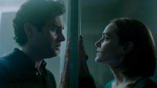 Penn Badgley and Madeline Brewer divided by glass in You