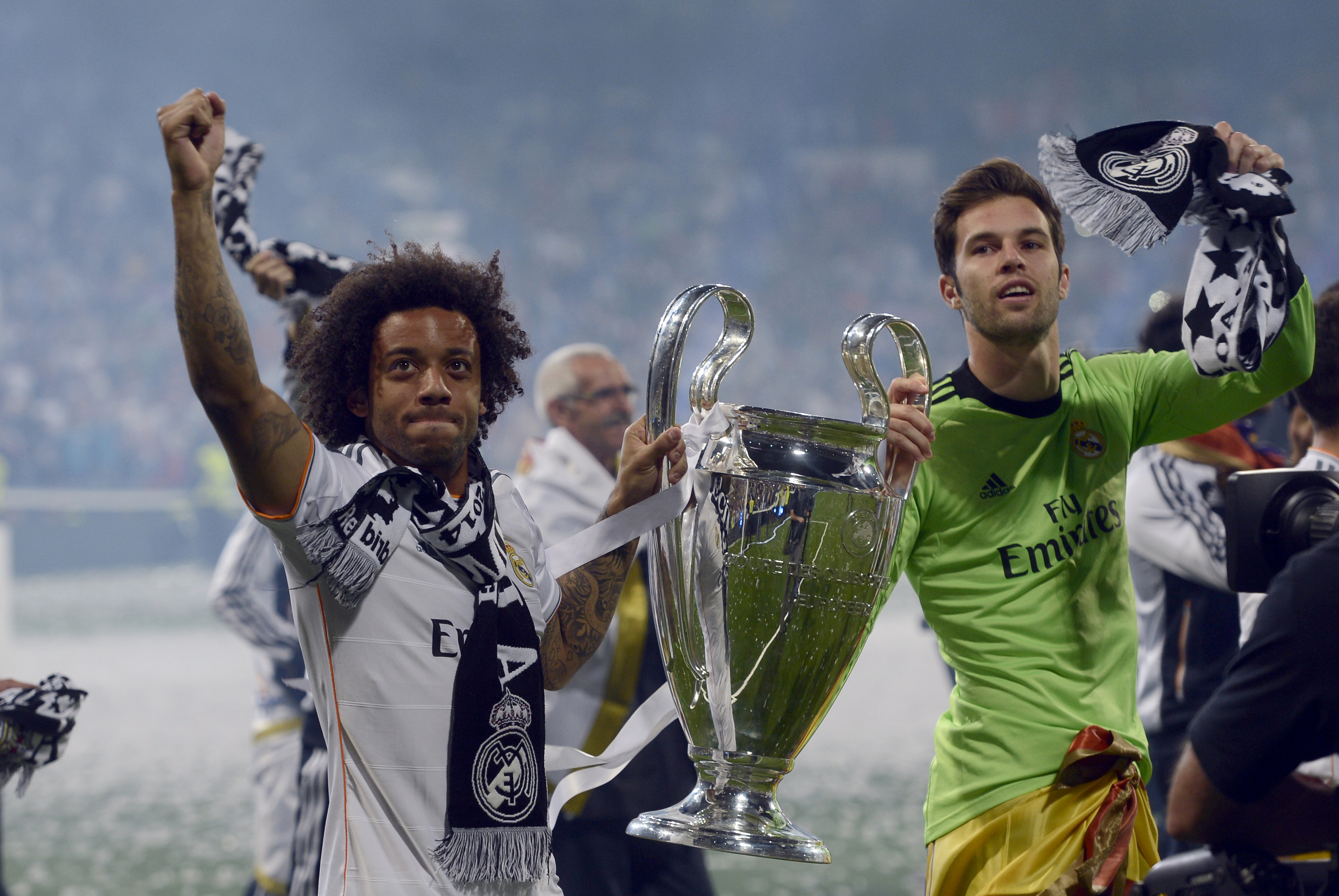 MADRID, SPAIN - MAY 25: Marcelo (L) of Real Madrid CF poses with the cup after winning the UEFA Champions League Final at Santiago Bernabeu stadium on May 25, 2014 in Madrid, Spain. (Photo by Evrim Ayd&amp;#305;n/Anadolu Agency/Getty Images)