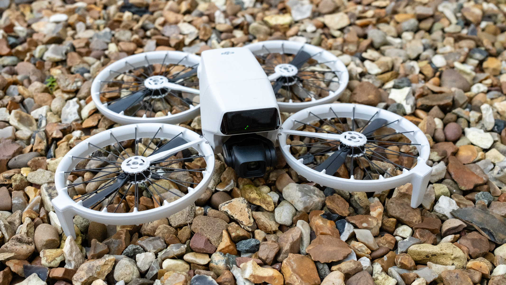 DJI Flip unfolded on gravel