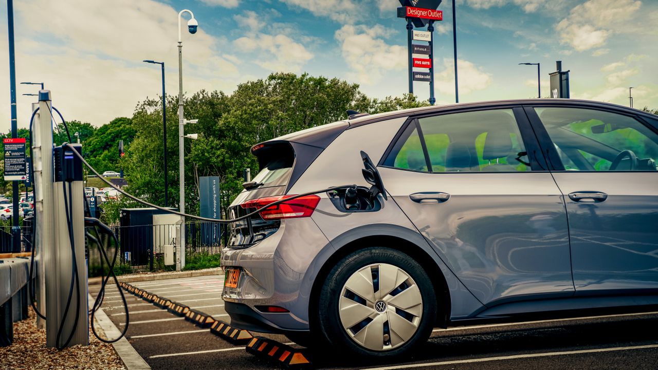 A car being charged in a car park