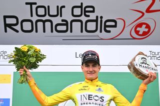 LEYSIN SWITZERLAND APRIL 27 Carlos Rodriguez of Spain and Team INEOS Grenadiers celebrates at podium as Yellow Leader Jersey winner during the 77th Tour De Romandie 2024 Stage 4 a 1592km stage from Saillon to Leysin 1314m UCIWT on April 27 2024 in Leysin Switzerland Photo by Luc ClaessenGetty Images