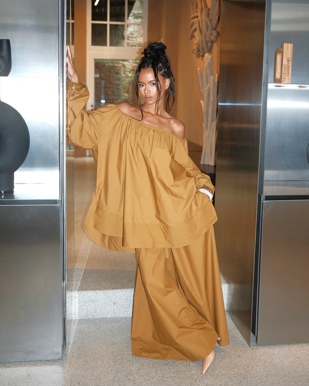 woman dressed in yellow