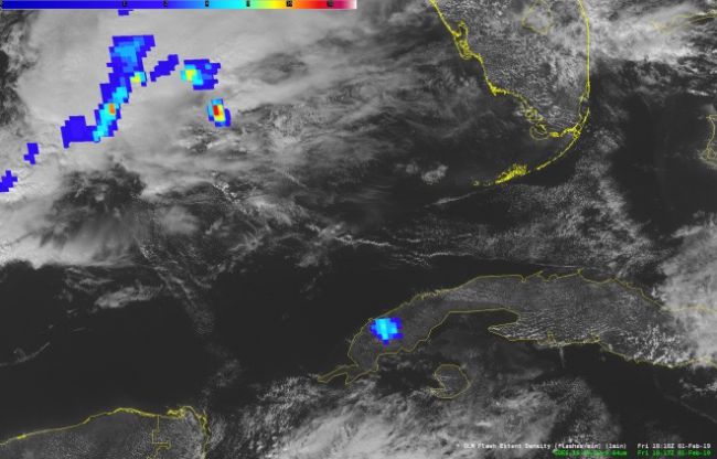 The Geostationary Lightning Mapper instrument aboard NOAA's GOES-16 satellite captured this view of the Feb. 1 meteor over Cuba (small blue patch at bottom center). The larger arc of blue in the upper left is lightning over the Gulf of Mexico.