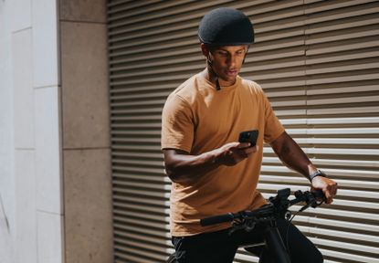 Image of ebike rider using app