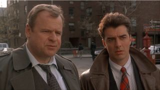 Greevey and Logan talking to a witness in Law & Order Season 1x01