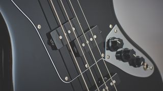 Close up of bass guitar pickups