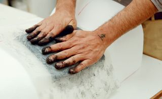 Pushing pulp onto a mould