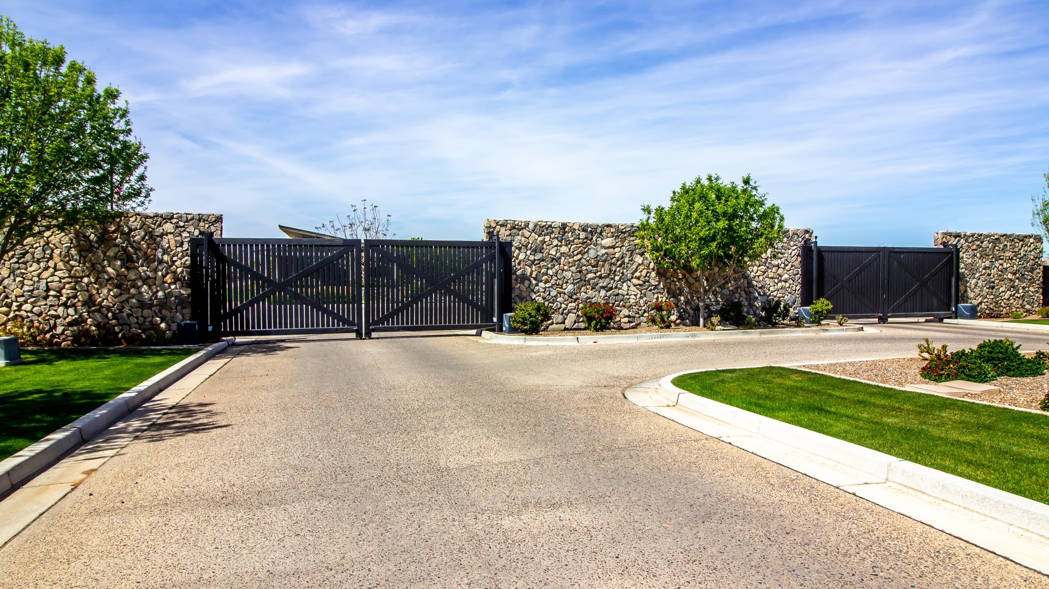 Electric swing gates on a large residential driveway