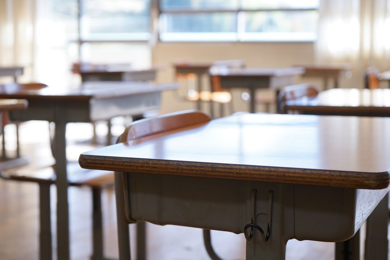 An empty classroom to represent teacher strike.