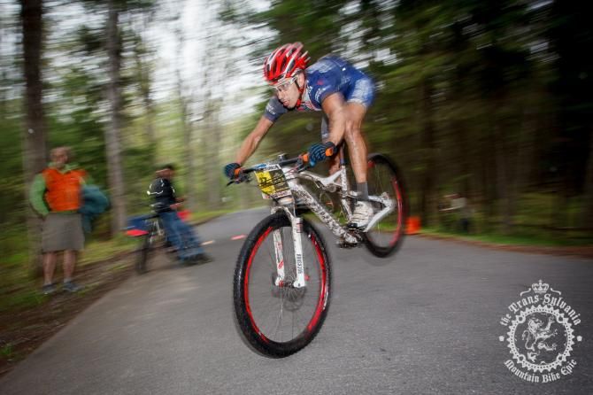 Cole Oberman catches air crossing a road gap jump en route to winning stage 5 of the Trans-Sylvania Epic.