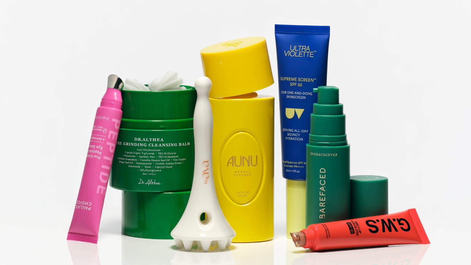 colorful skincare products assembled on a white background