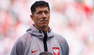 Robert Lewandowski of Poland walks into the pitch prior to the international friendly match between Poland and Ukraine at Tarczynski Arena