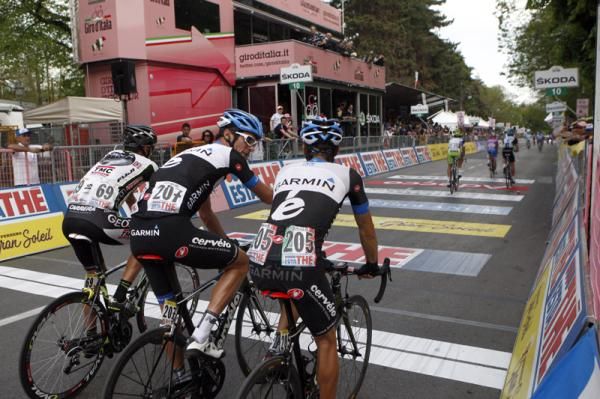 David Millar crosses the line